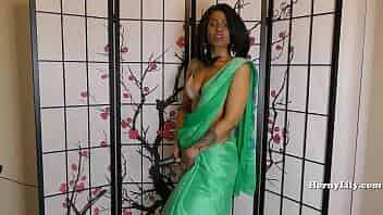 Indian milf teasing in green saree