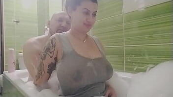 Hot pregnant teen wet clothes in the bath