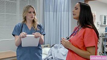 Strict blonde physician eating her busty lesbian nurses pussy