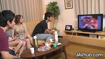 Two petite Japanese girlfriends sucking and fucking their boyfriends in a naughty foursome